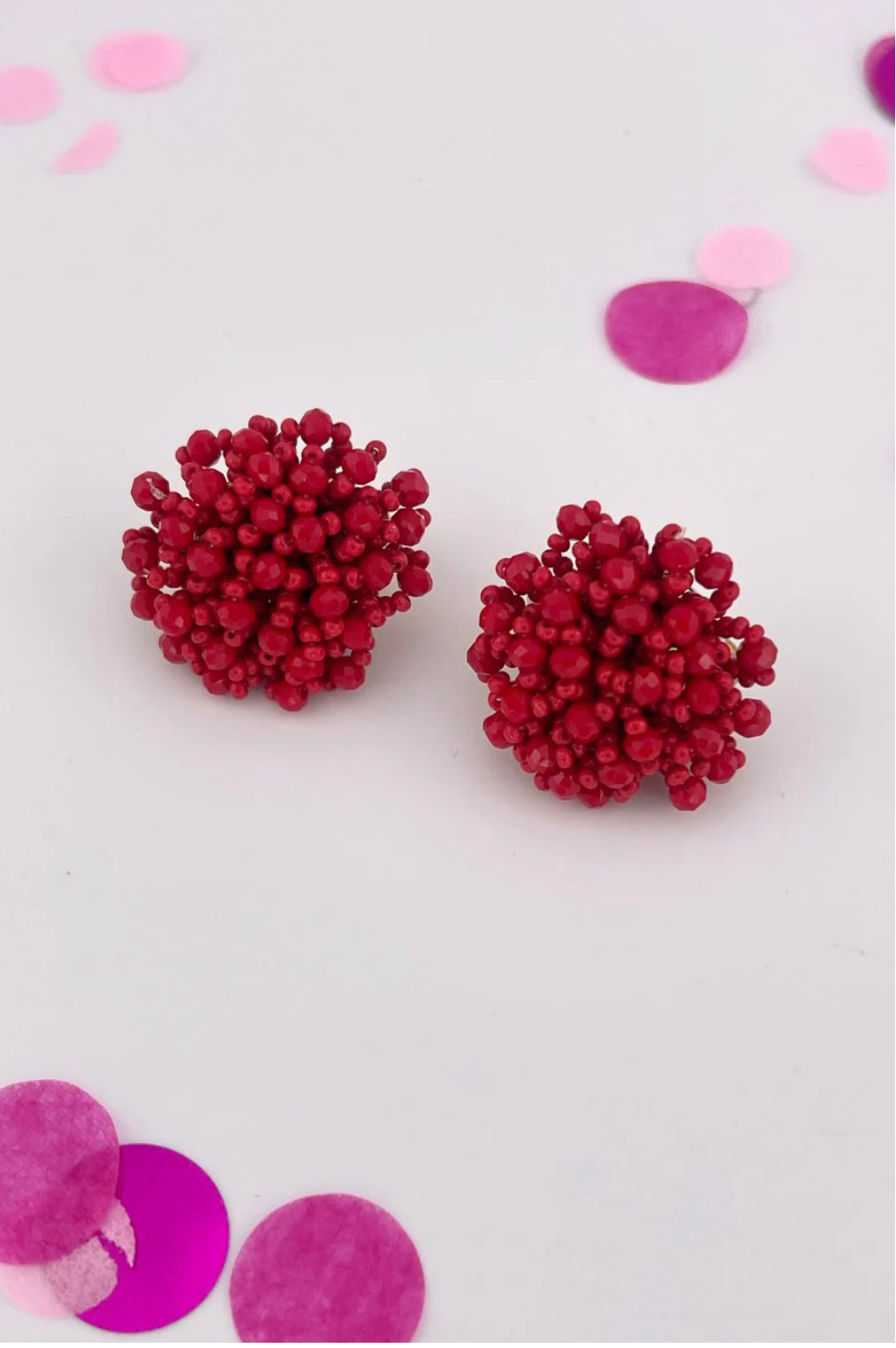 Clip on pom earrings